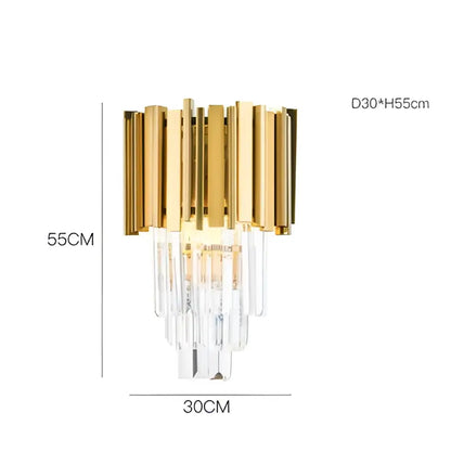 Modern chrome crystal oval led chandelier featuring a gold-toned wall sconce with cascading clear crystal rods decorbites crystal oval