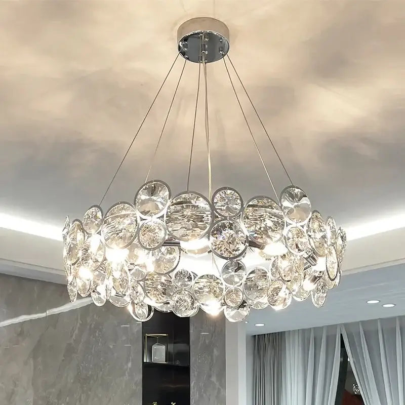 Modern chrome crystal ring chandelier with clear glass discs and circular design for elegant dining room decorbites crystal ring