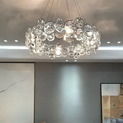 Modern chrome crystal ring chandelier with clear bubble glass orbs arranged in a circular pattern for dining room decorbites crystal ring
