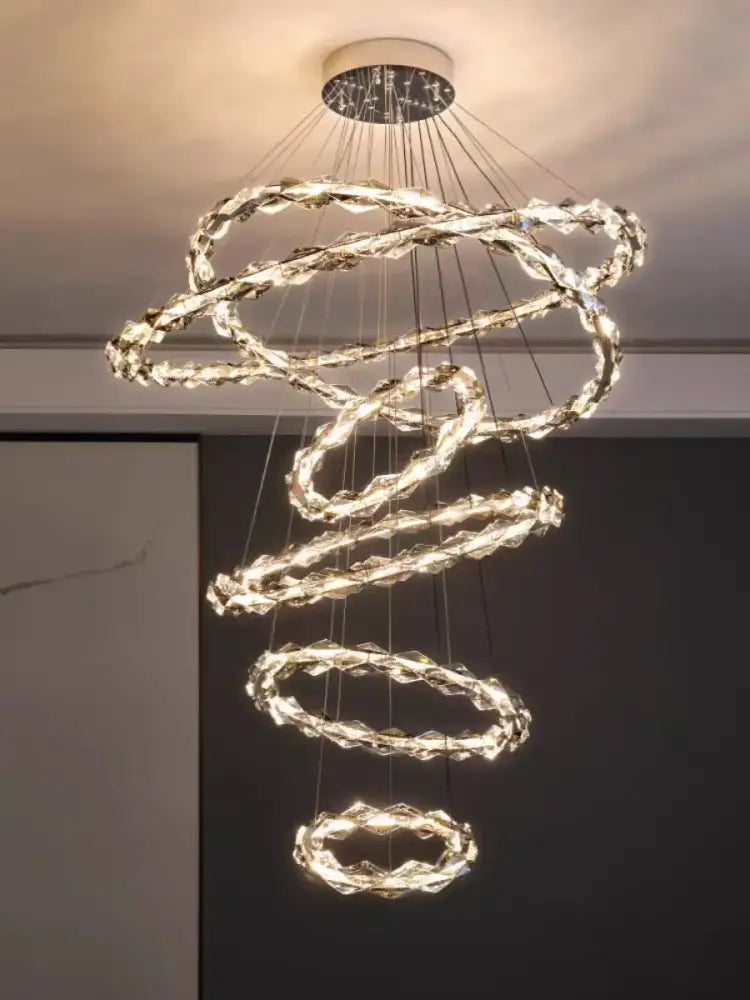 Modern chrome decorbites crystal ring chandelier with multiple glowing crystal rings for dining room lighting