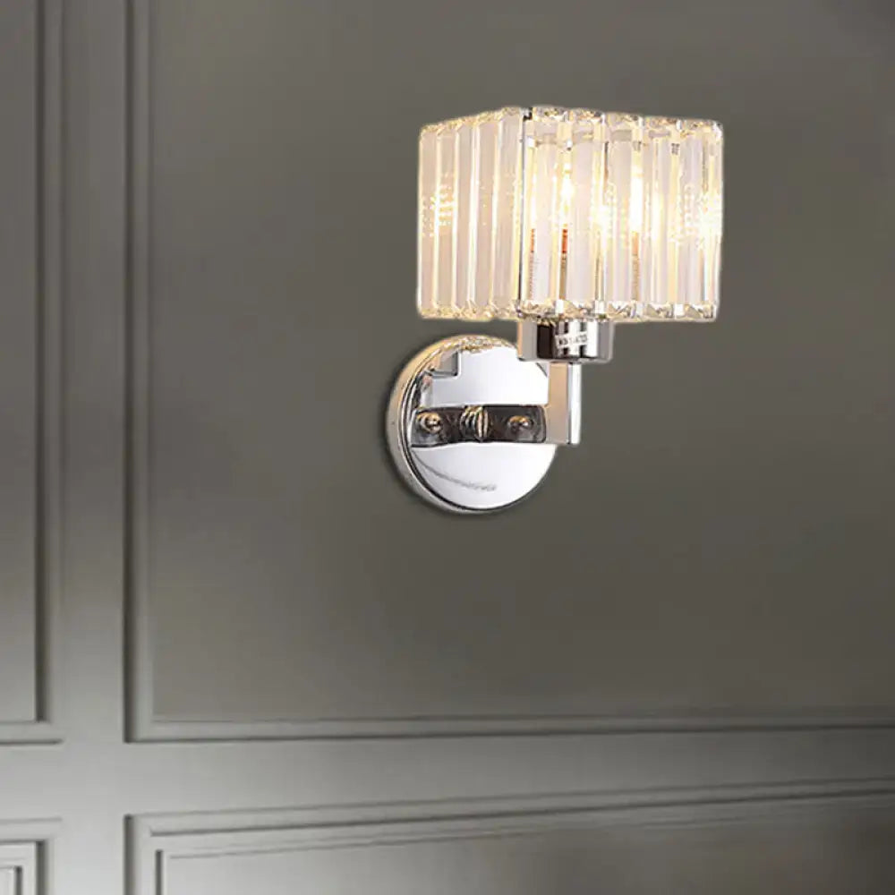 Modern chrome crystal sconce light with polished chrome base and clear crystal prism shade for hallway wall sconce light