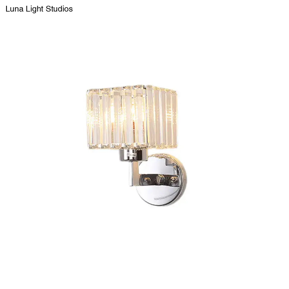 Modern chrome crystal sconce light with a rectangular faceted crystal shade and polished chrome base for hallway wall mount