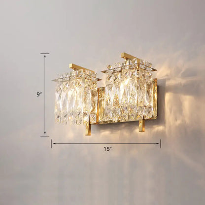 Gold-toned modern chrome crystal shade sconce light wall mount with cascading crystal prisms for elegant bedroom lighting