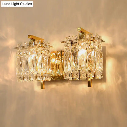 Gold-toned crystal shade sconce light with cascading faceted crystals wall mount for modern bedroom lighting