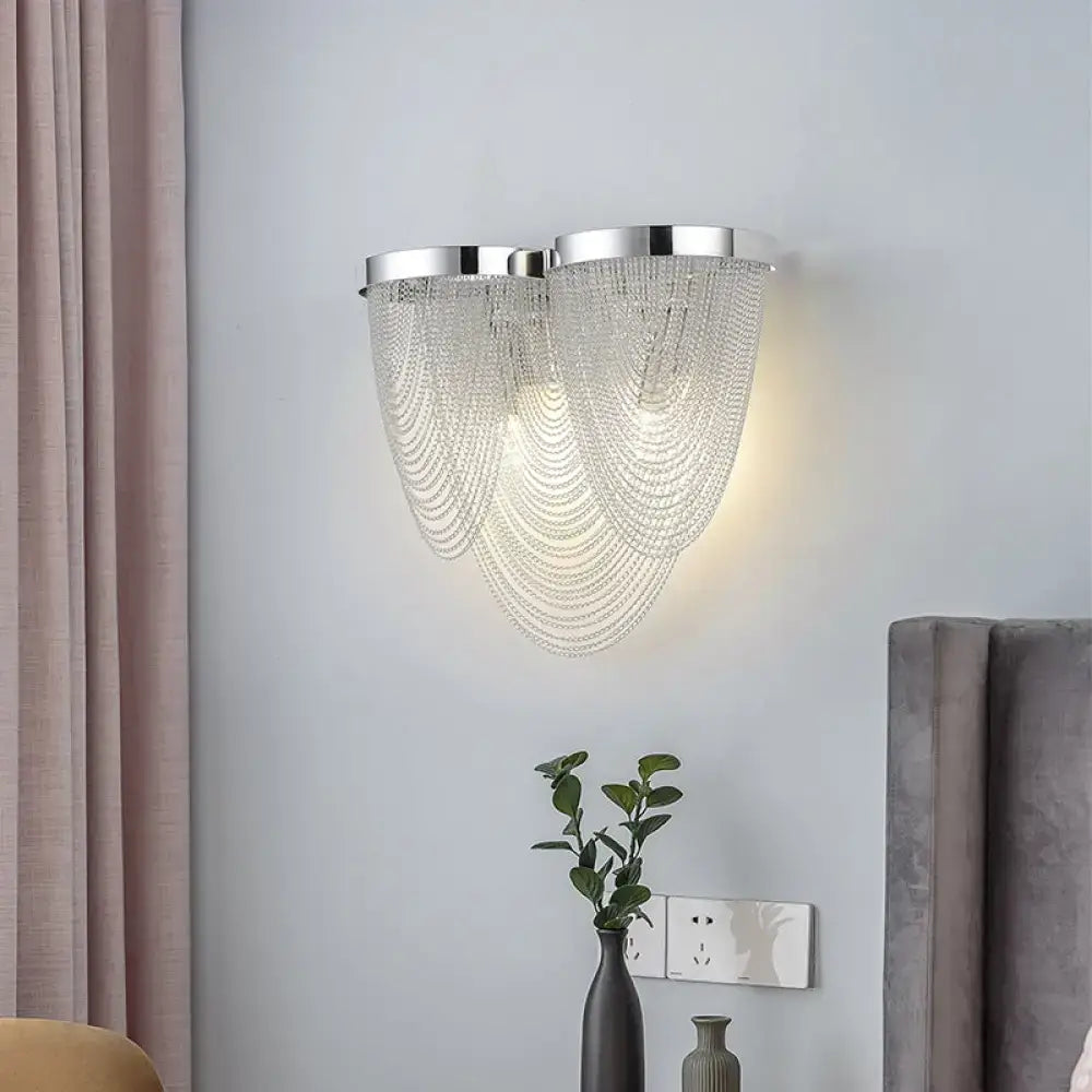 Modern chrome crystal tassel wall lamp with two fixtures and clear bead strands for living room sconce lighting