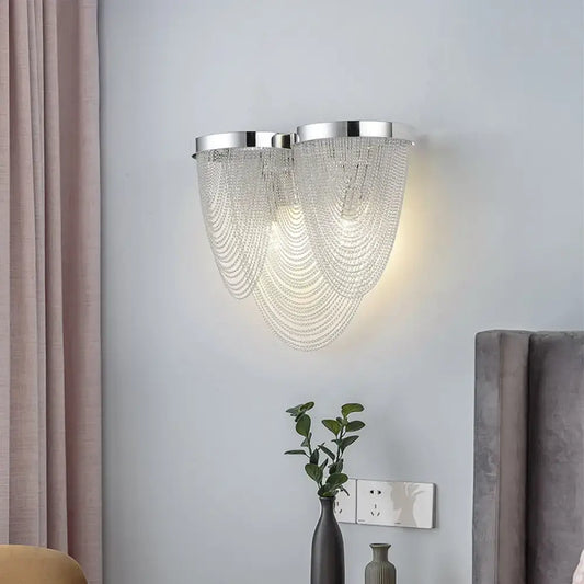 Modern chrome crystal tassel wall lamp with two fixtures and clear bead strands for living room sconce lighting