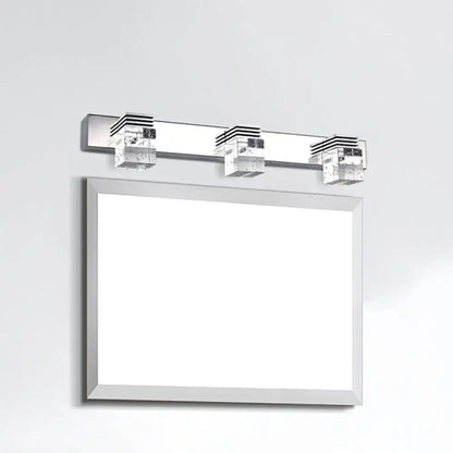 Modern chrome crystal vanity light fixture with three crystal-encased led fixtures for bathroom use