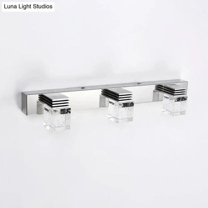 Modern chrome crystal vanity light fixture with three sleek geometric lights for bathroom wall installation