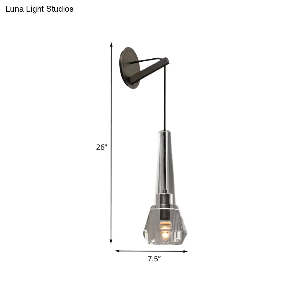 Modern chrome crystal wall lamp with brushed black metal mount, clear glass shade, and dangling cord fixture type