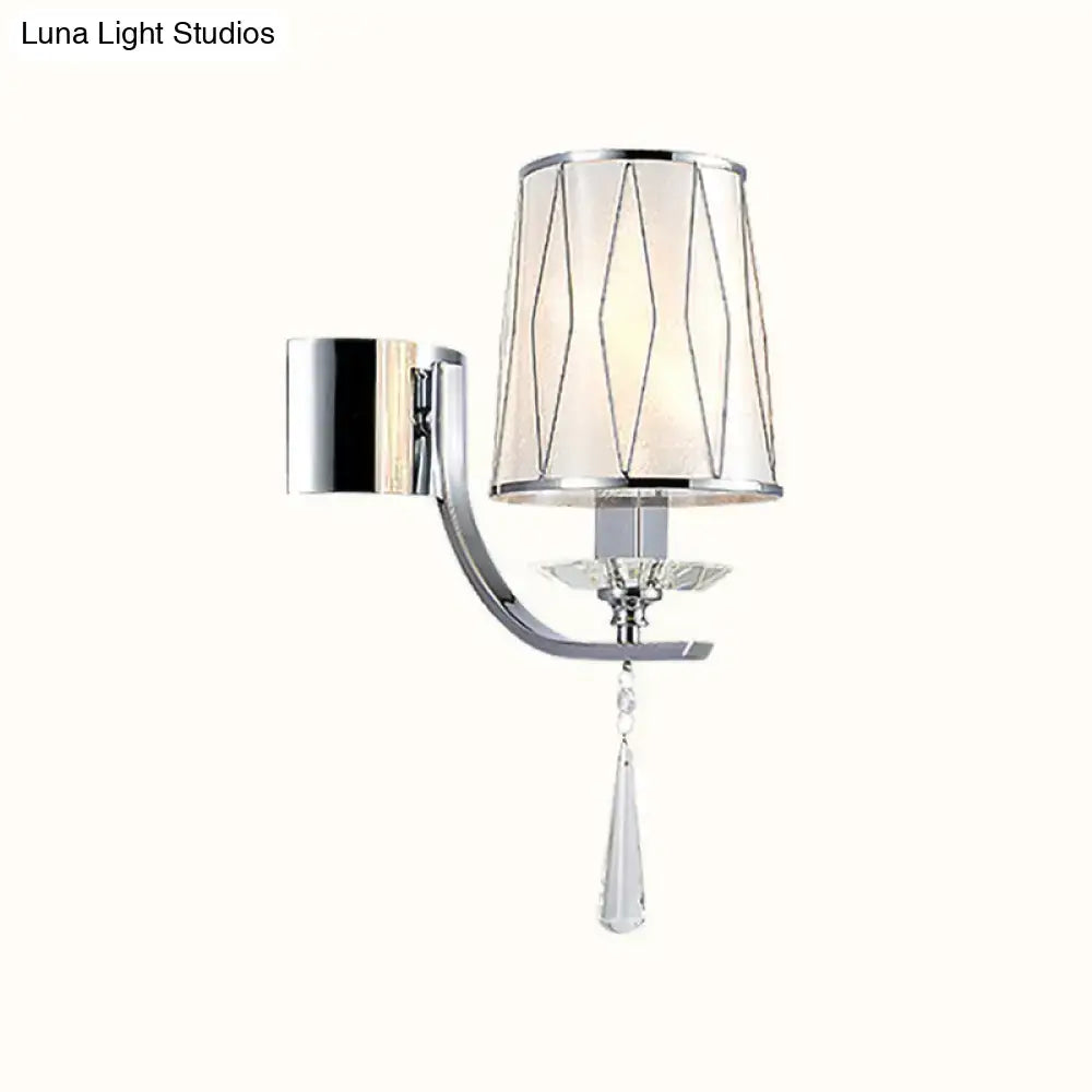 Modern chrome wall lighting fixture with frosted glass shade, geometric wire accents, and crystal pendant for bedroom or hallway lighting