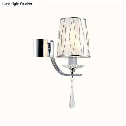 Modern chrome wall lighting fixture with frosted glass shade, geometric wire accents, and crystal pendant for bedroom or hallway lighting