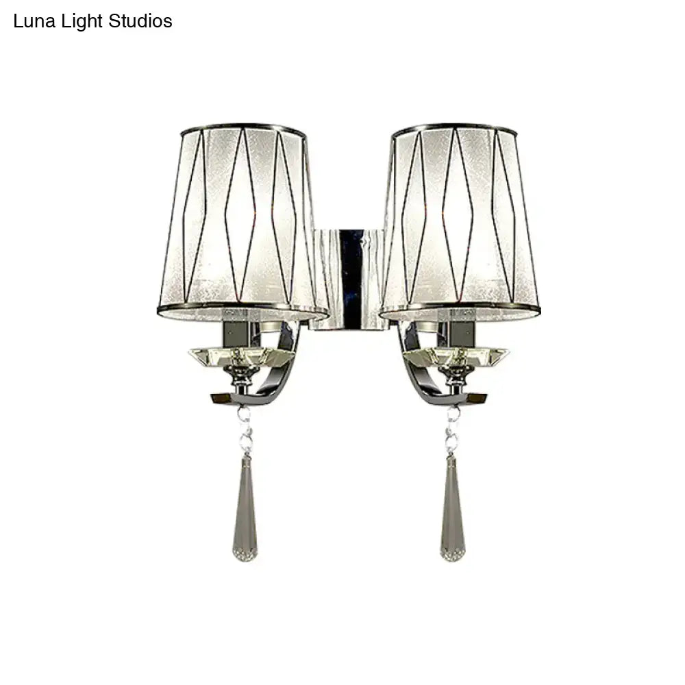 Modern chrome double-arm wall lighting fixture with frosted glass shades geometric wire and crystal teardrop pendants