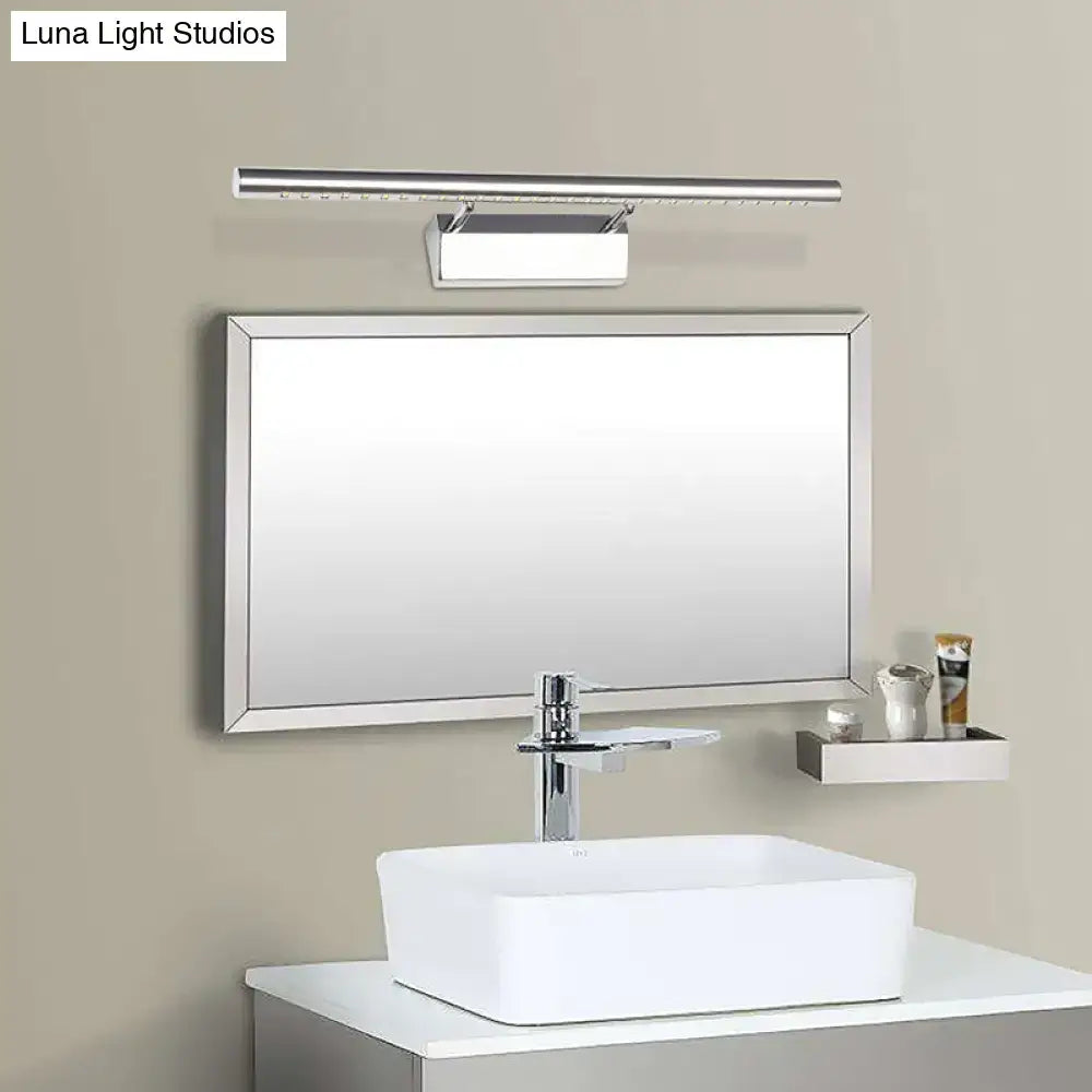 Modern rectangular bathroom mirror with sleek silver frame paired with chrome cylinder vanity lighting led wall sconce