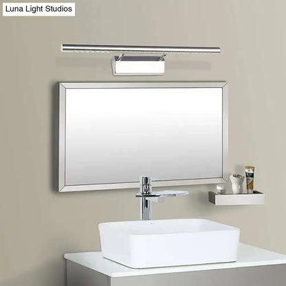 Modern rectangular bathroom mirror with sleek silver frame paired with chrome cylinder vanity lighting led wall sconce