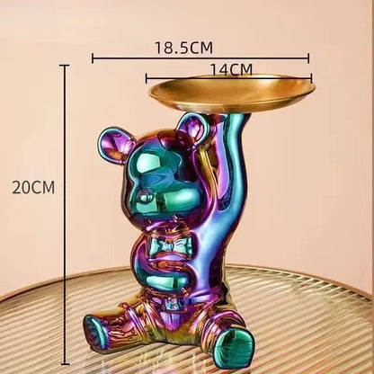 Iridescent chrome decorbites bear doll holding a golden doll storage tray for living room key holder use