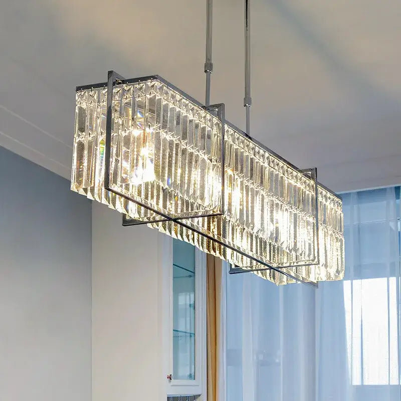 Modern chrome decorbites crystal chandelier with sleek chrome frame and vertical faceted glass panels for dining room