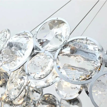 A cluster of clear faceted crystal pendants with polished silver frames for modern chrome decorbites crystal led chandelier