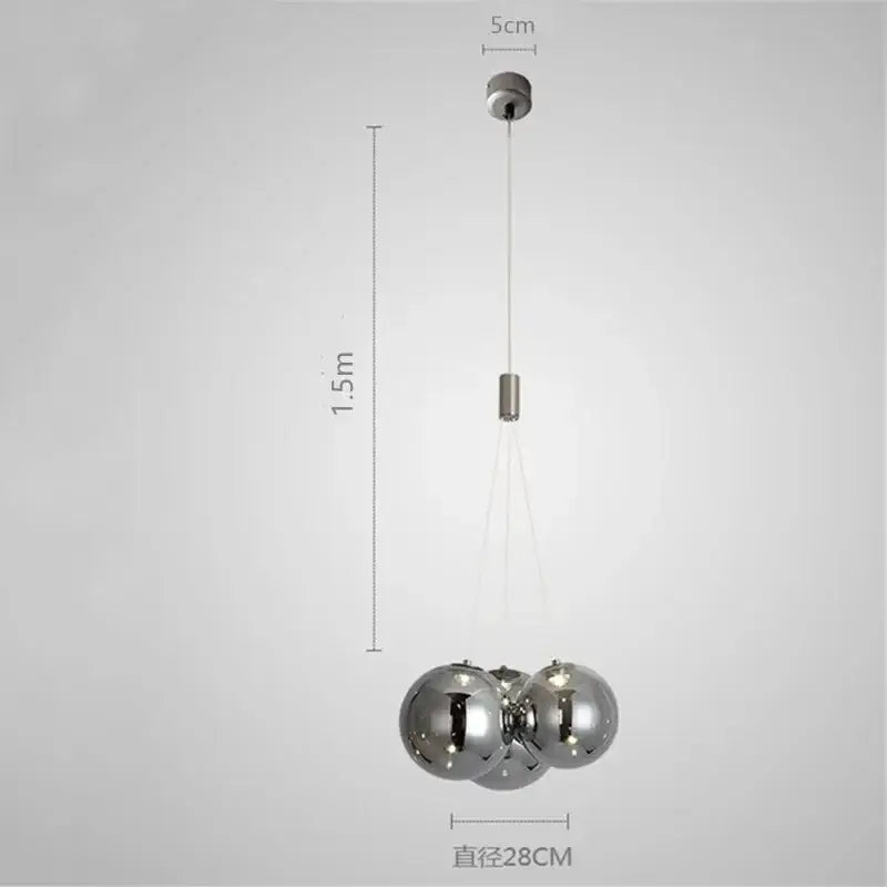 Modern chrome decorbites glass ball pendant light with three reflective orbs suspended by thin cables for living room