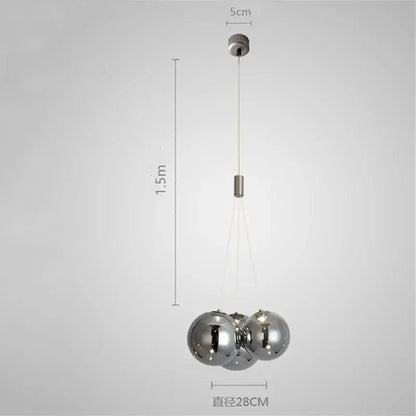Modern chrome decorbites glass ball pendant light with three reflective orbs suspended by thin cables for living room