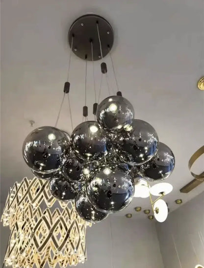 Modern chrome decorbites glass ball pendant light with spherical glass orbs and dark metal mount for living room light fixture
