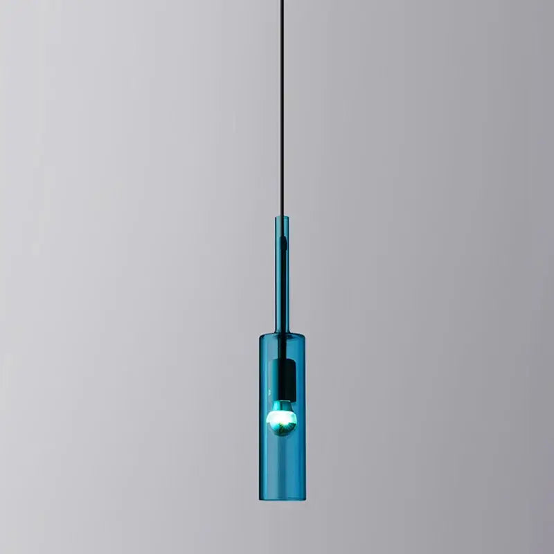 A sleek translucent teal glass chandelier pendant light with minimalist cylindrical design for living room decorbites glass chandeliers