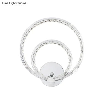 Modern chrome dual ring led wall mounted light with textured beaded edge rings for bedroom use