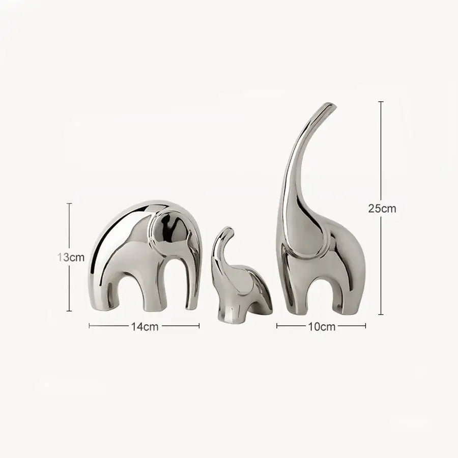 Set of three sleek polished silver ceramic elephant sculpture bookends by decorbites for modern living room decor