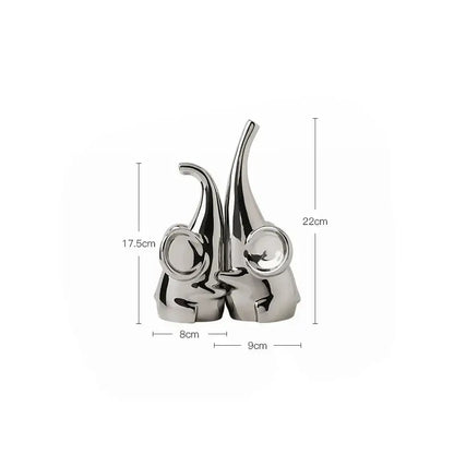 Modern chrome elephant sculpture ceramic bookends featuring shiny silver gnome figurines for living room decorbites elephant sculpture