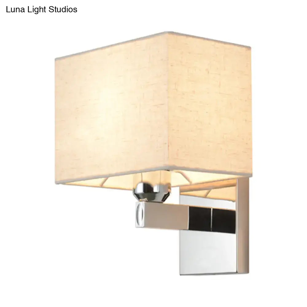 Modern chrome fabric led wall sconce with beige linen shade and square metal frame for bedroom lighting