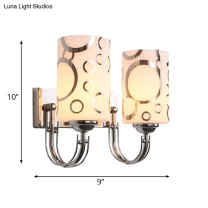 Modern chrome finish abstract glass wall sconce with two frosted glass shades and gold concentric circles 110v-120v