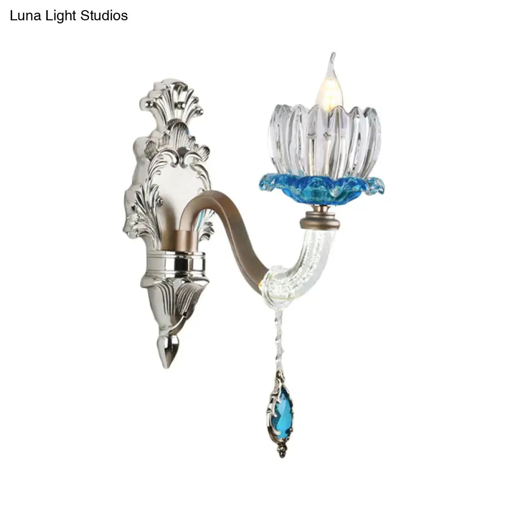 Elegant modern wall light with chrome finish clear glass and blue crystal accent for bedroom sconce lighting