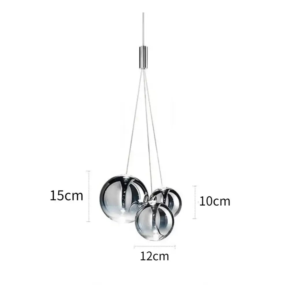 Modern chrome glass ball pendant light fixture with three interconnected glass orbs for dining room decorbites pendant light