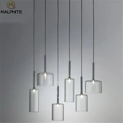 Modern chrome glass bottle pendant light with clear glass cylindrical shades and sleek chrome stems for dining room decorbites glass bottle pendant