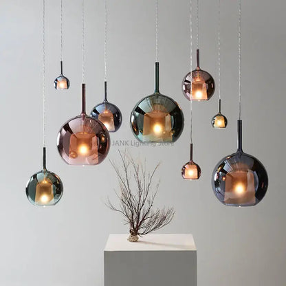 Modern chrome decorbites glass bubble pendant lights in copper rose gold and dark gray finishes for dining room chandelier