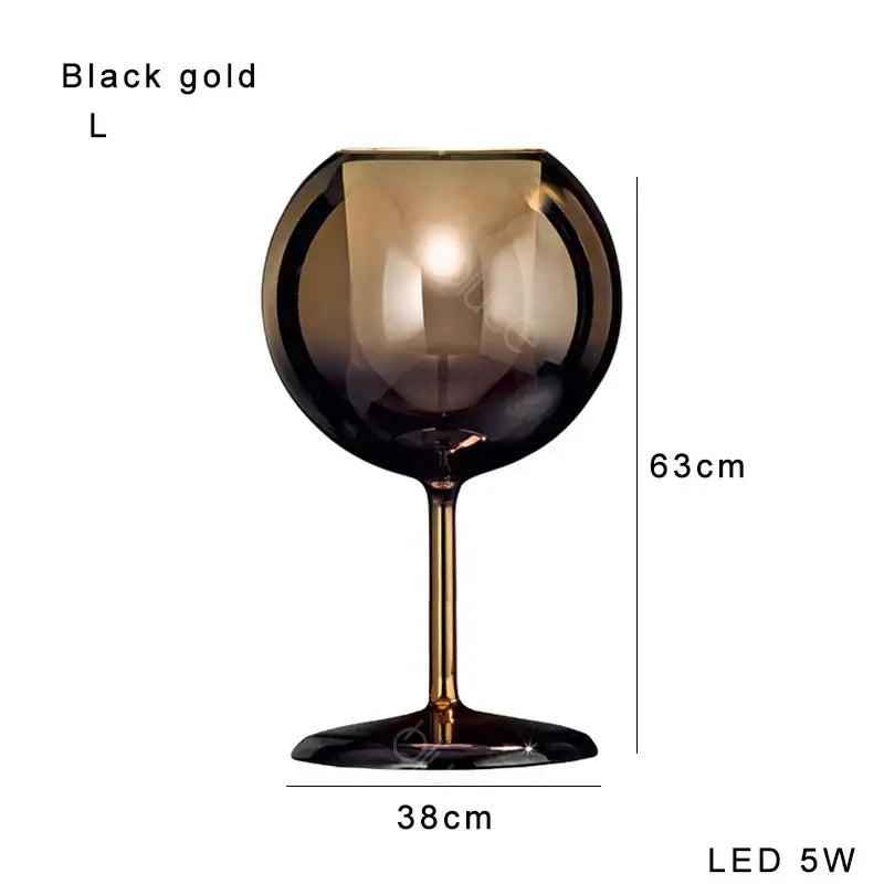 Modern chrome glass gold table lamp with a black gold led slim stem and amber-tinted decorbites glass gold bowl