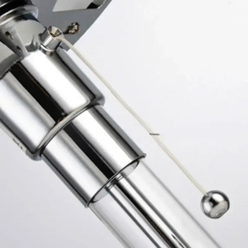 Modern chrome glass table lamp with shiny chrome-finished telescopic pole and spherical counterweight for decorbites glass table lamp