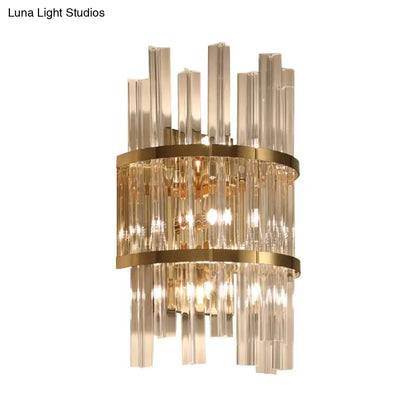 Gold-toned crystal prism sconce wall lamp with cascading glass rods and chrome gold horizontal metallic bands for living room