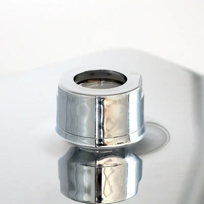 Modern chrome and gold square rainfall shower head with chrome-finished cylindrical faucet aerator and polished edges