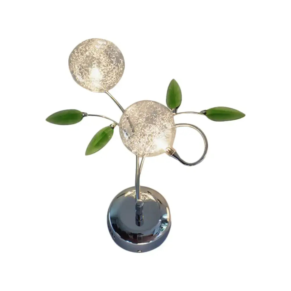 Modern chrome green crystal leaf wall mount lamp featuring two crackled glass globes for bedroom lighting