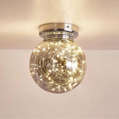 Modern chrome gypsophila led ceiling light with a glass globe and warm white fairy lights for bedroom decorbites gypsophila led