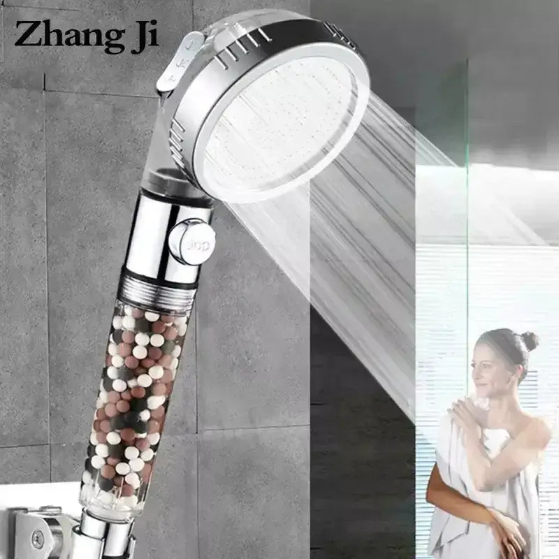 Modern chrome high pressure anion shower head with stop button and transparent filter housing filled with multicolored beads by zhang ji
