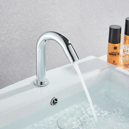 Modern chrome infrared sensor faucet with single-handle and sleek curved spout for touchless bathroom basin mixer
