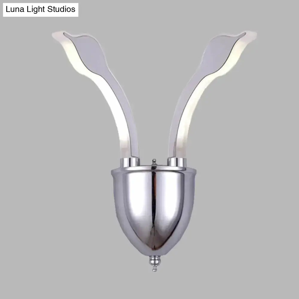 Modern chrome leaf led wall sconce with two curved arms resembling rabbit ears featuring warm white light acrylic shade