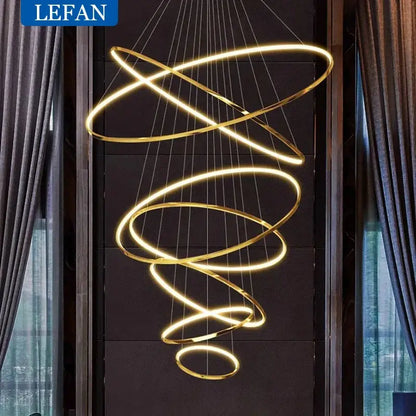 Gold-toned led spiral pendant light with modern minimalist design ideal for living room use with energy-efficient led bulbs