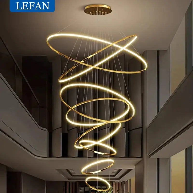 Modern chrome pendant light with gold-toned spiral led bulbs and multiple glowing rings ideal for living room square meters