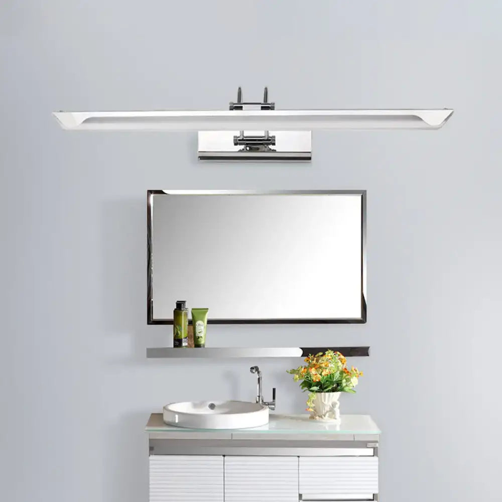 Modern chrome LED wall light with warm white light above a sleek black-framed rectangular bathroom mirror