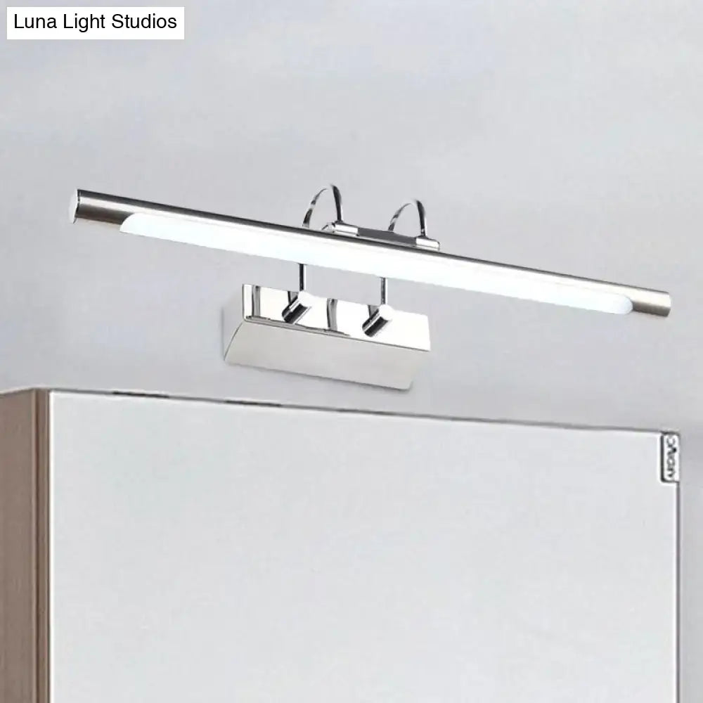 Modern chrome led wall light with sleek rectangular design and three adjustable spotlights emitting warm white light