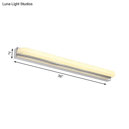 Modern chrome led wall mounted vanity light with sleek silver metal frame and warm white diffused lighting 36 inches long