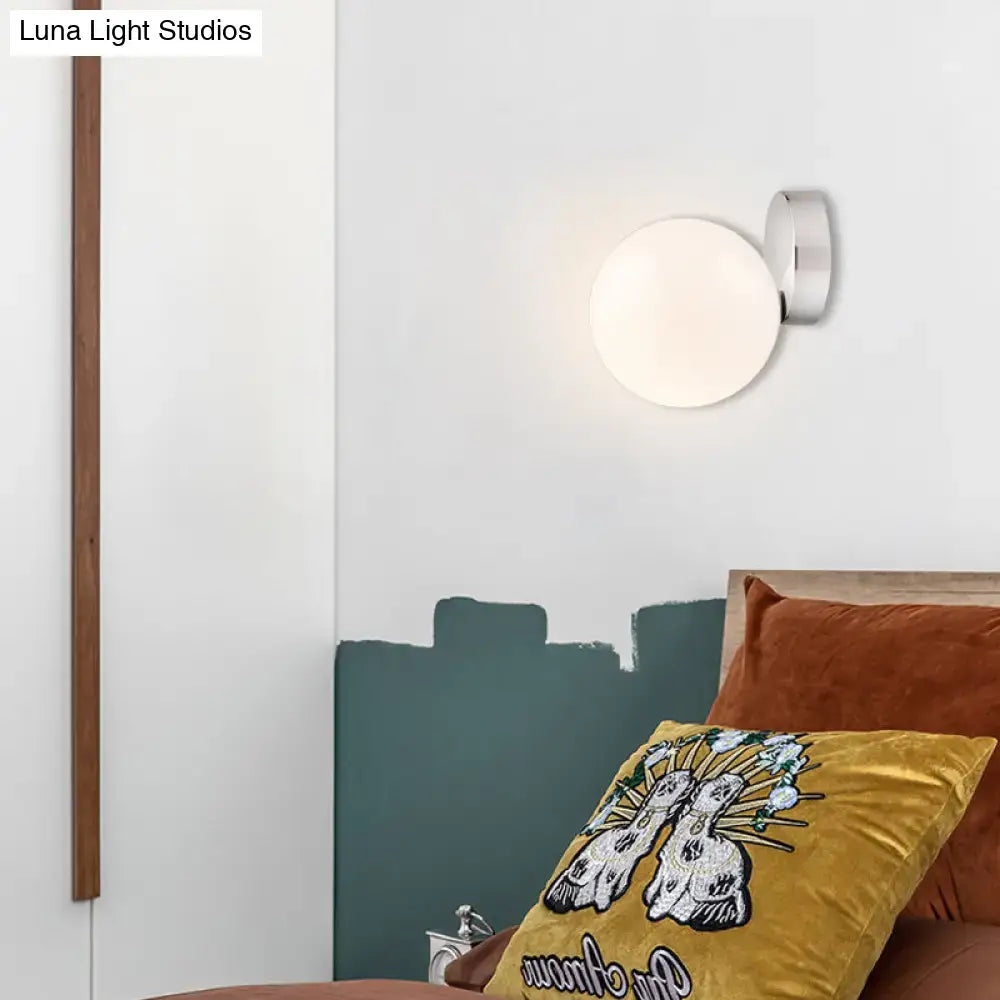 Modern chrome wall lamp with milk glass globe and polished chrome bracket for living room wall mounted lamp use
