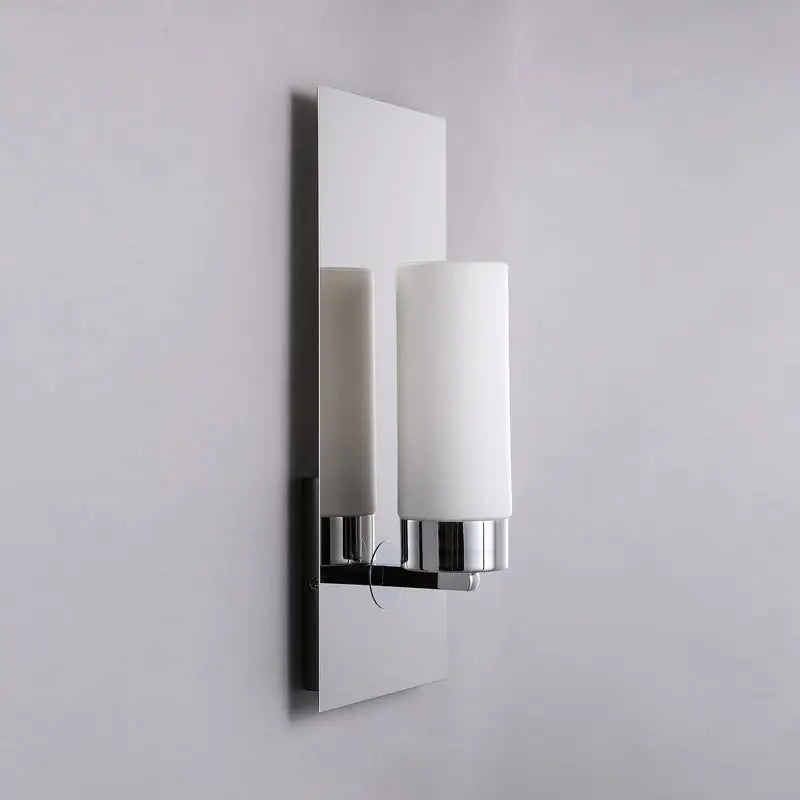 Modern chrome opal glass tube wall light with sleek rectangular backplate and frosted white opal glass shade for bedroom